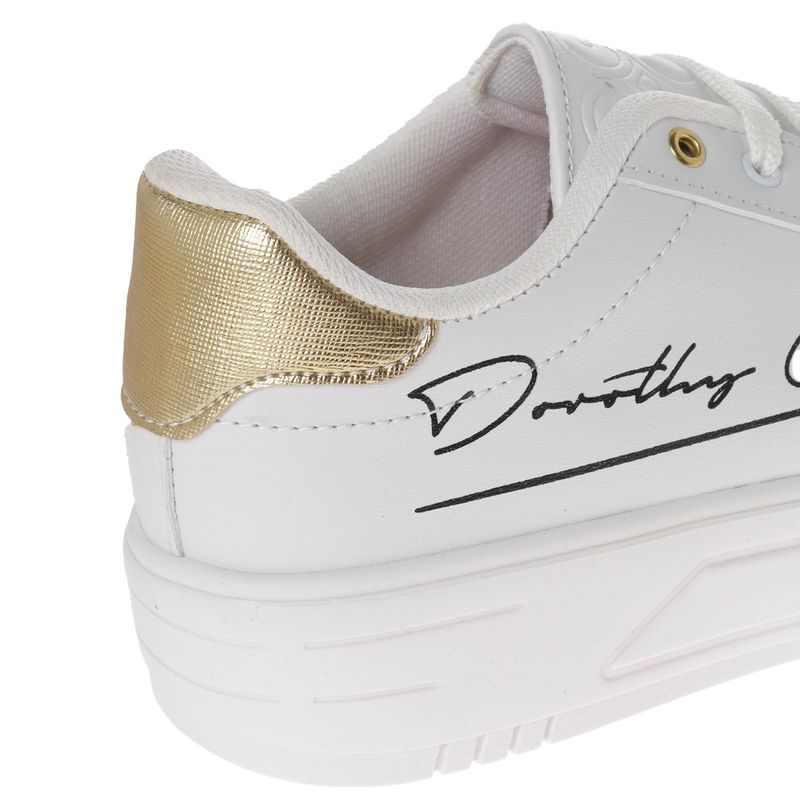 Tenis Aitana color blanco con firma Dorothy Gaynor y dorado